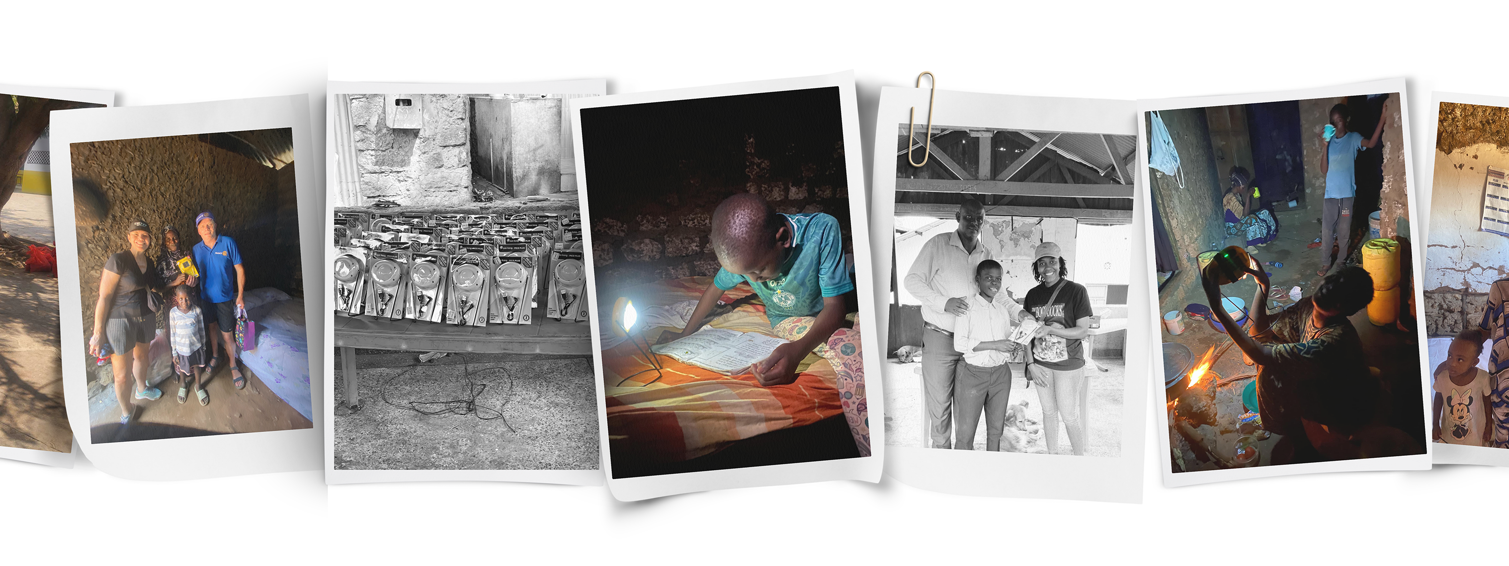 ShuZu team distributing solar lights to children in Africa, enabling kids to study and read after dark